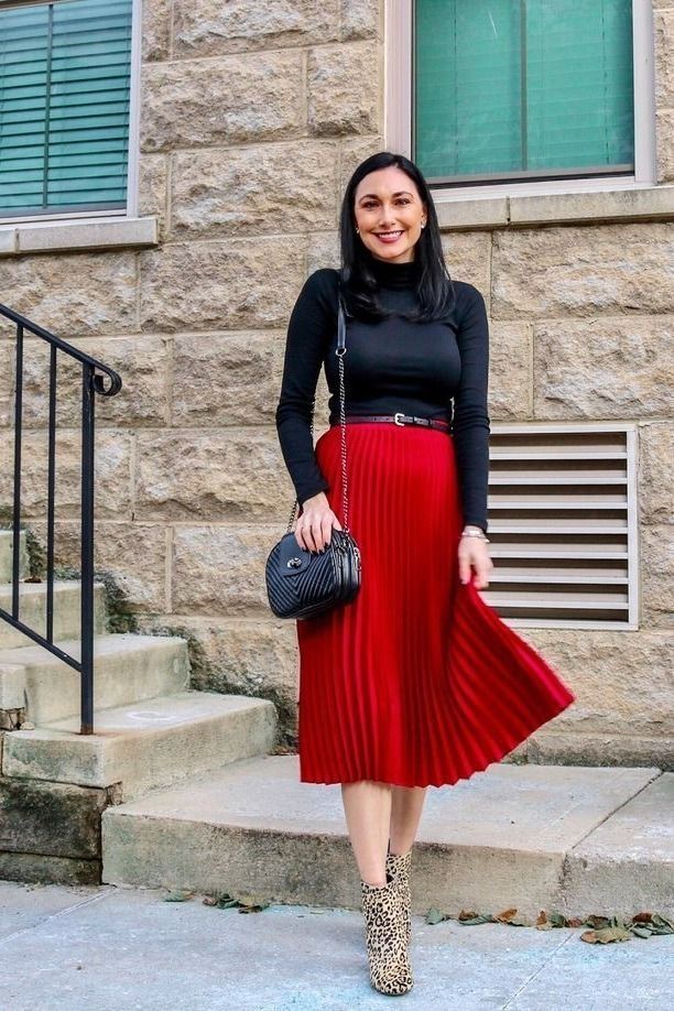 A Black Turtleneck With a Red Midi Skirt