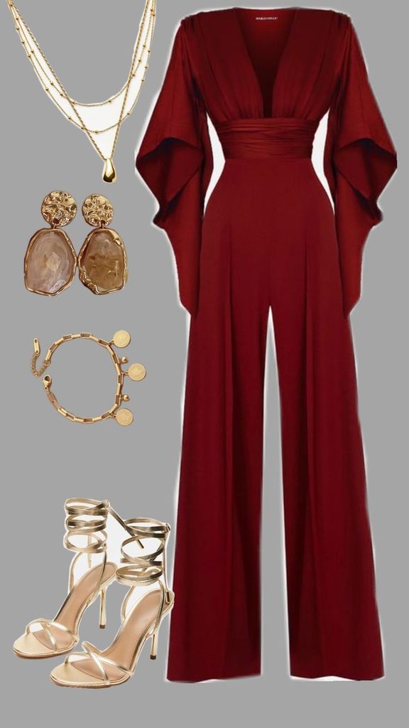 A Burgundy Jumpsuit With Gold Jewelry