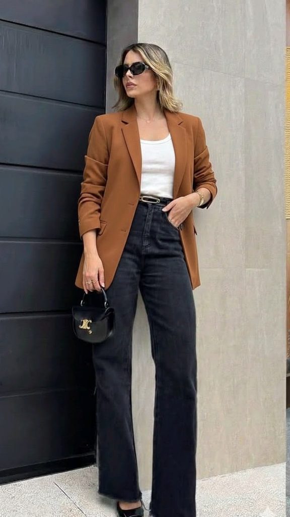 A Camel Blazer With Dark-Wash Jeans