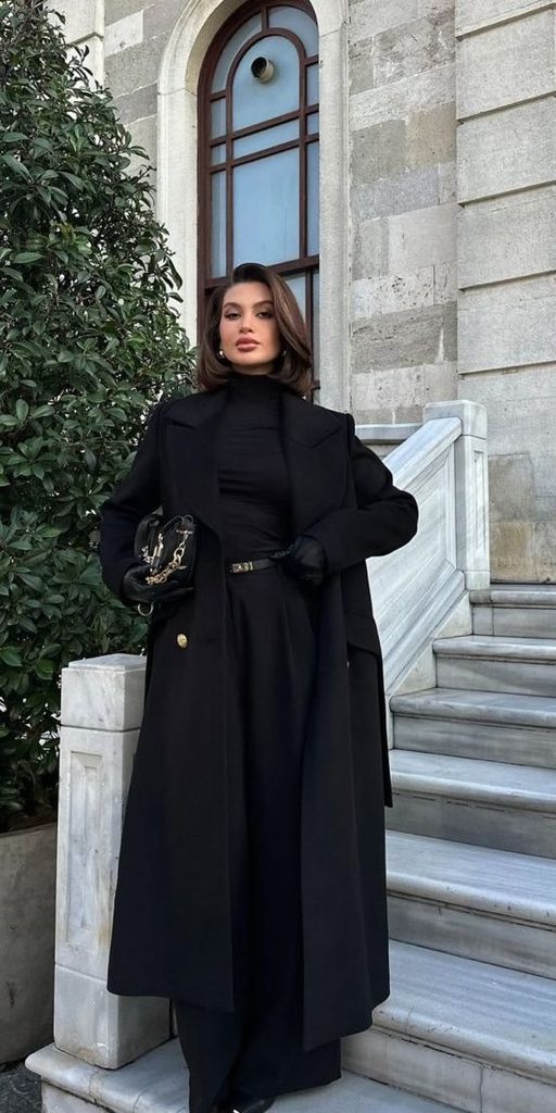 A Chic All-Black Outfit With Festive Accessories