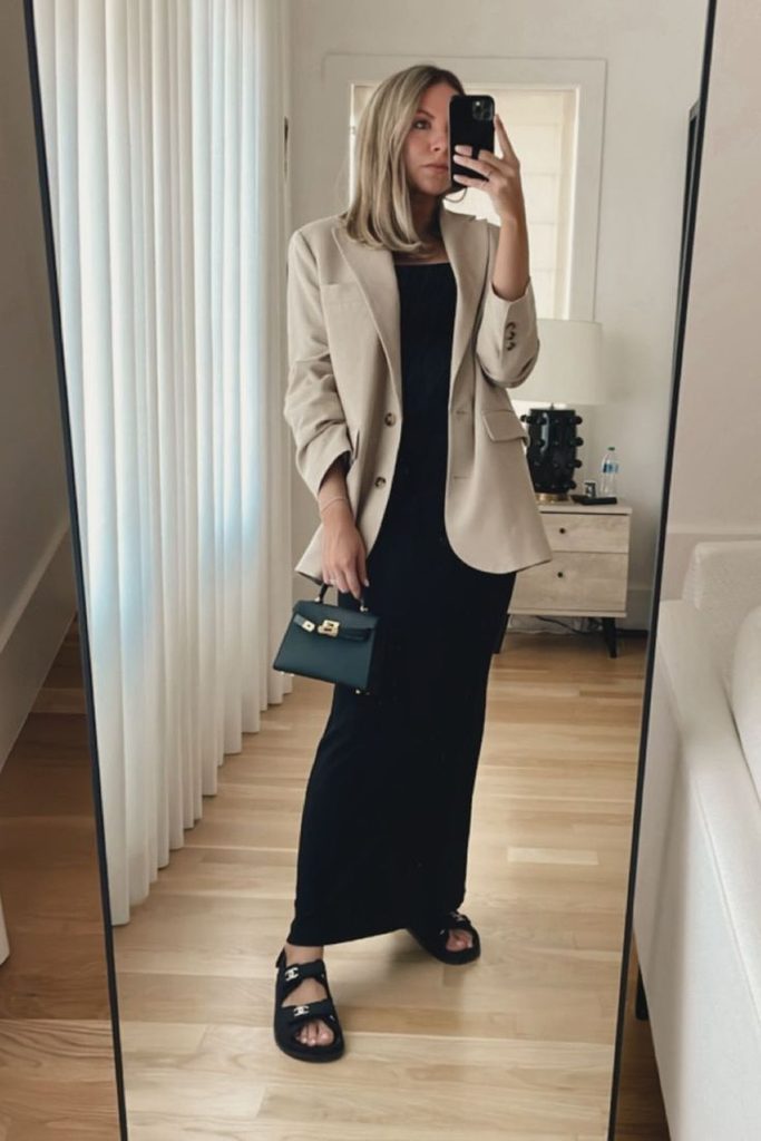 A Cream Blazer With a Black Maxi Dress