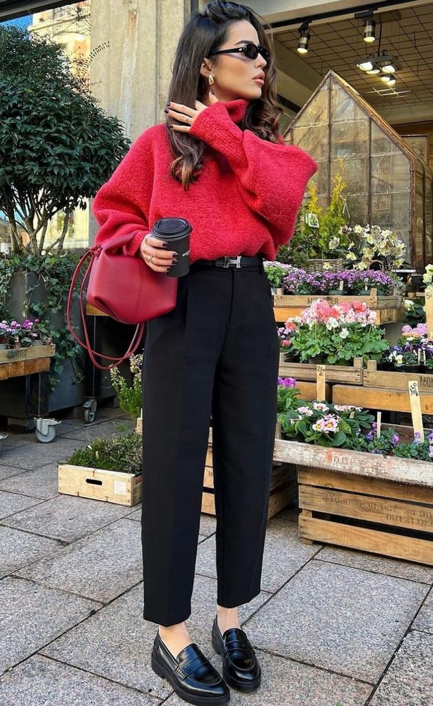 A Festive Red Sweater With Black Trousers