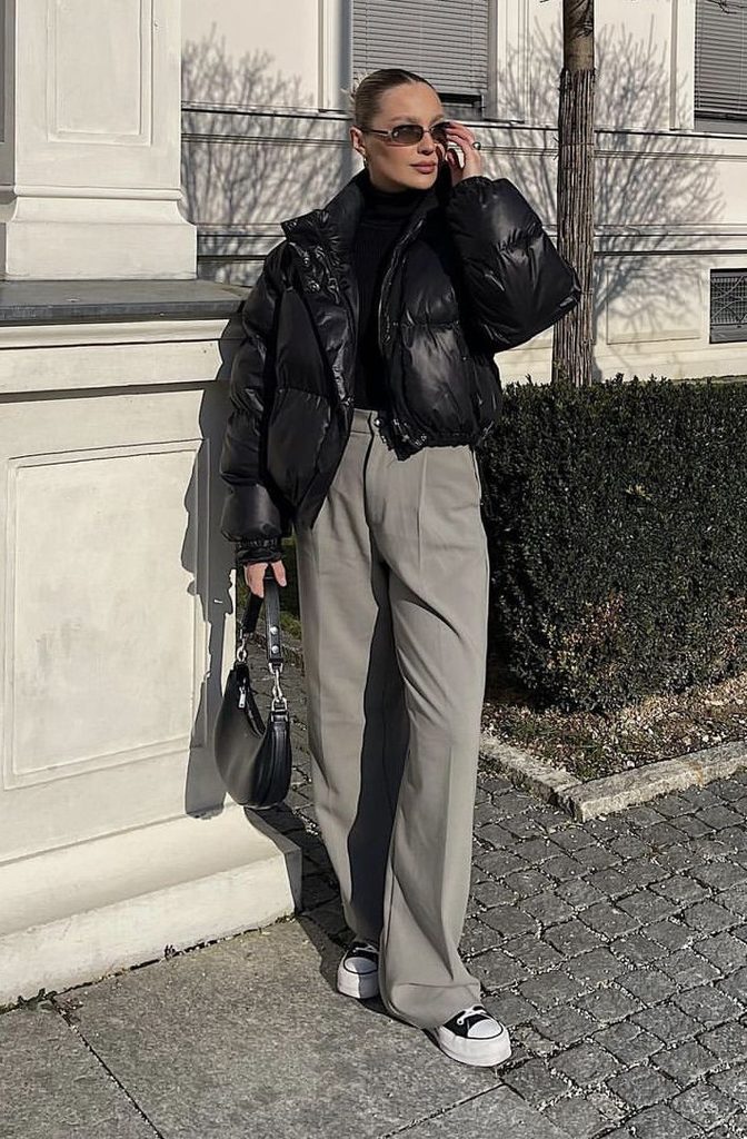 A Puffer Jacket with Tailored Trousers