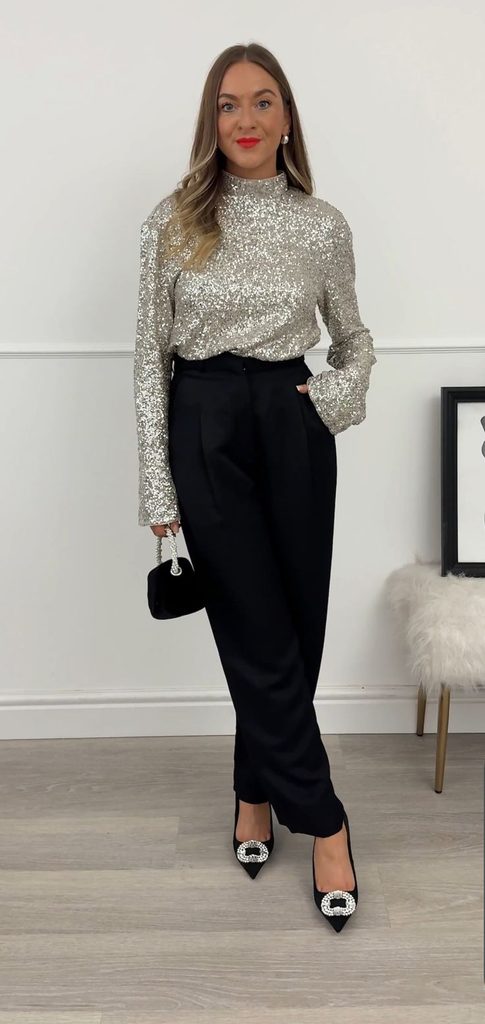 A Sequin Top With Tailored Black Trousers