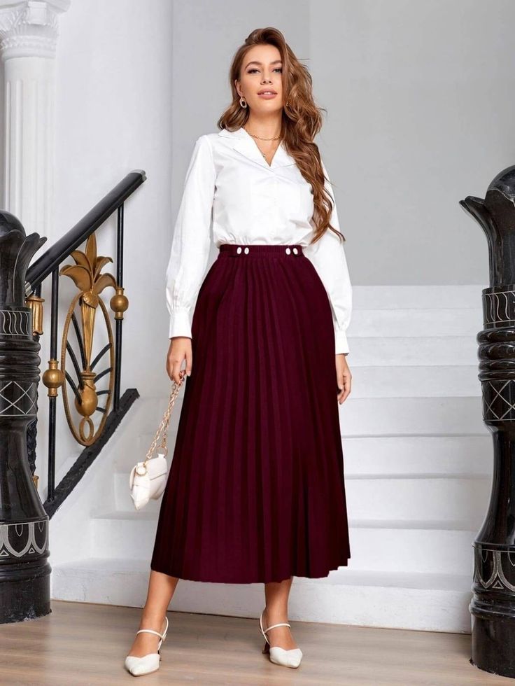 A White Blouse With a Burgundy Pleated Skirt